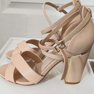 Nude strappy heels